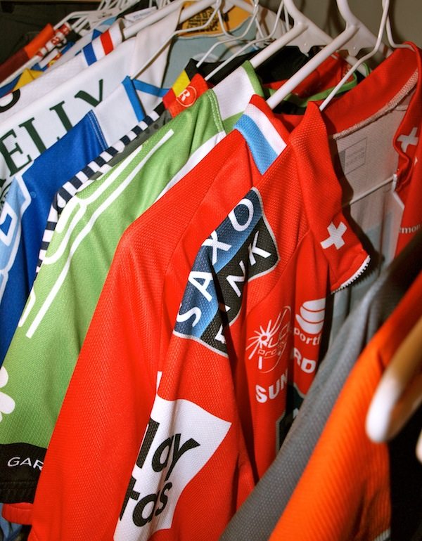 A closet full of cycling jerseys